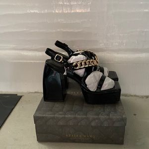 Azalea Wang “NOT GOING HOME CHUNKY SANDAL” in size 11, color black.